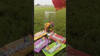 Filling Colorful SkittlesSour Candy's | on a Campaign Glass  #skittles #asmrsounds #shorts