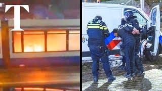 Tram set on fire during violent clashes in Amsterdam