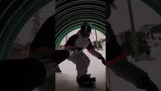 Try something different- Snowboarding through the small tunnel