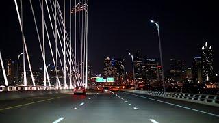 Crossing The Margaret Hunt Hill Bridge At Night in Dallas, Texas