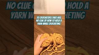 Watch this video if you have no clue of how to hold a crochet yarn