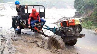 The superhero/spider-man helps the farmer load sand onto the tractor under heavy rain.