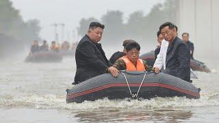 North Korean leader Kim inspects flooded area on rubber boat | AFP