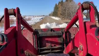 Moving snow on the homestead to reduce flooding!