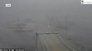 Hurricane Milton: Tornado sweeps over bridge during meteorologist's live report