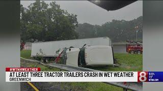 At least 3 tractor-trailers crash in wet weather in Greenwich