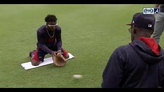 Ron Washington runs Braves rookie Ozzie Albies through fielding drills