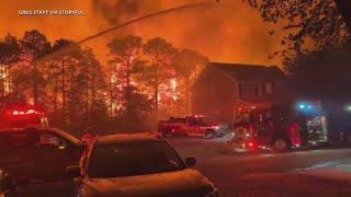 Firefighters working to contain wildfires in the Carolinas