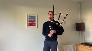 Connor Sinclair playing the Legacy Heritage Bagpipes