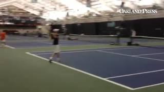 Novi's Maxx Anderson and Brother Rice's Jack Winkler with the rally. #miprepzonetennis