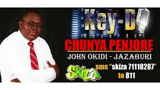 CHUNYA PENJORE - JOHN OKIDI ( SKIZA 71118287)