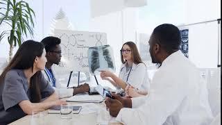 qualified doctors are analyzing x ray of lungs a 86SQ57J