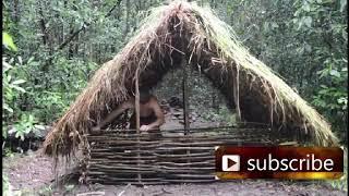 Primitive man builds thatched grass hut in minutes, best survival skill