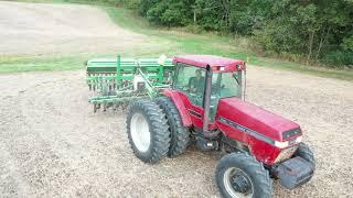 Case IH 7140 and 15' great plains no till drill.