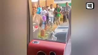 Wizkid Waves,Shakes Street Fans From His Car And An Excited Fan Refused To Let Go