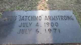 Kevin Grace visits the grave of jazz legend Louis Armstrong