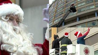 Santa, superheroes surprised patients at Children`s Wisconsin on Christmas