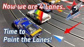 Now that we are a 4 lane slot car track... we have to paint the lanes!