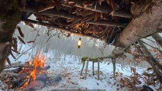 Solo Winter Camping in the Wild ForestBuilding a Shelter Under a Fallen TreeNo Sleeping Bag, No Tent