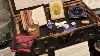 May Hollister Woolsey and her trunk at the Sacramento History Museum