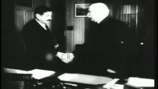 Marshal Petain and Pierre Laval discuss in the office of the Vichy regime in Fran...HD Stock Footage