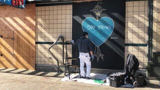 Seattle artist Dozfy brings beauty to boarded-up businesses - KING 5 Evening