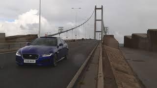 Jaguar enthusiasts club crossing the Humber bridge