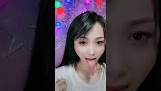 Chinese woman loves to show off her freakishly long tongue with tricks