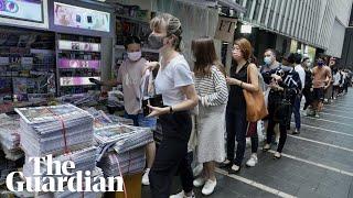 Large crowds queue in Hong Kong for final Apple Daily edition