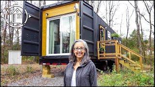 Her fabulous shipping container home in a tiny house village