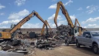 Heavy Scrap Yard machinery working violently Southern Metals Wilmington, North Carolina