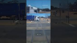 Freight train and truck seconds from disastrous collision