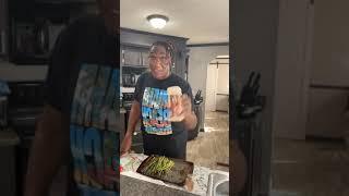 Mrs. Netta is cooking Charles lunch with her seafood seasoning