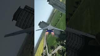 Flying at very low altitude and passing through buildings, simulating