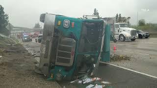 Garbage Truck Overturns on LA Freeway