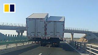 Truck in China carries 2 containers side by side, blocking traffic on highway