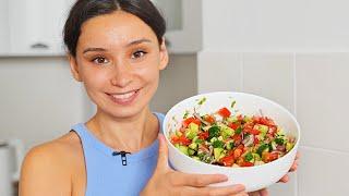 Incredibly delicious simple salad with tomatoes, cucumbers and avocados