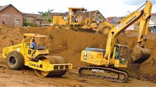 Excavator Dump Trucks Motor Grader Compactor Busy  Working On Toll Road Construction