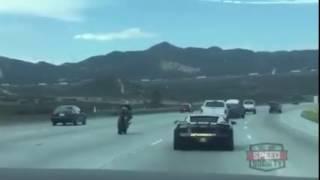 Street bike busting wheelie down the 15 freeway during Gold Rush Rally