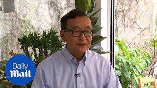 Opposition leader Sam Rainsy denounces Cambodia's 'sham election'