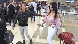 Iggy Pop And His Red Hot Wife Fly Out Of LAX