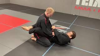 Caio Magalhães BJJ black belt instrutor lapel choke