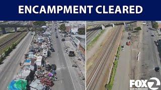 Oakland clears out massive homeless encampment near I-880 | KTVU