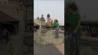 Trying To Pull The Sword Out Of The Stone At Disneyland Paris