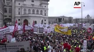 Austria's public workers protest over 2 year pay freeze; anti govt demos in Italy