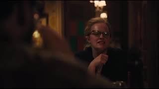 Elizabeth Moss Footsie Under the Table