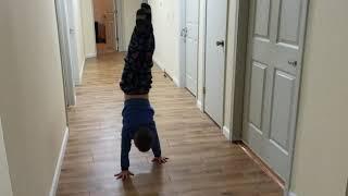 7 year old boy walking on hands