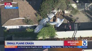 Small plane crashes in home's backyard