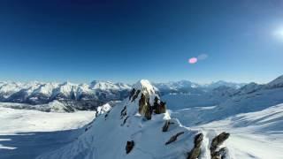 CFN | Winter 2016 issue | flying over snow covered mountains aerial view winter landscape