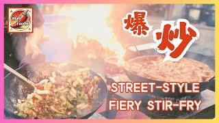 A collection of street-side Sichuan cuisine, with the chef handling the wok with effortless grace!